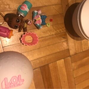 5/15$ L.O.L. Surprise! Doll with Pink and Blue Accessories​